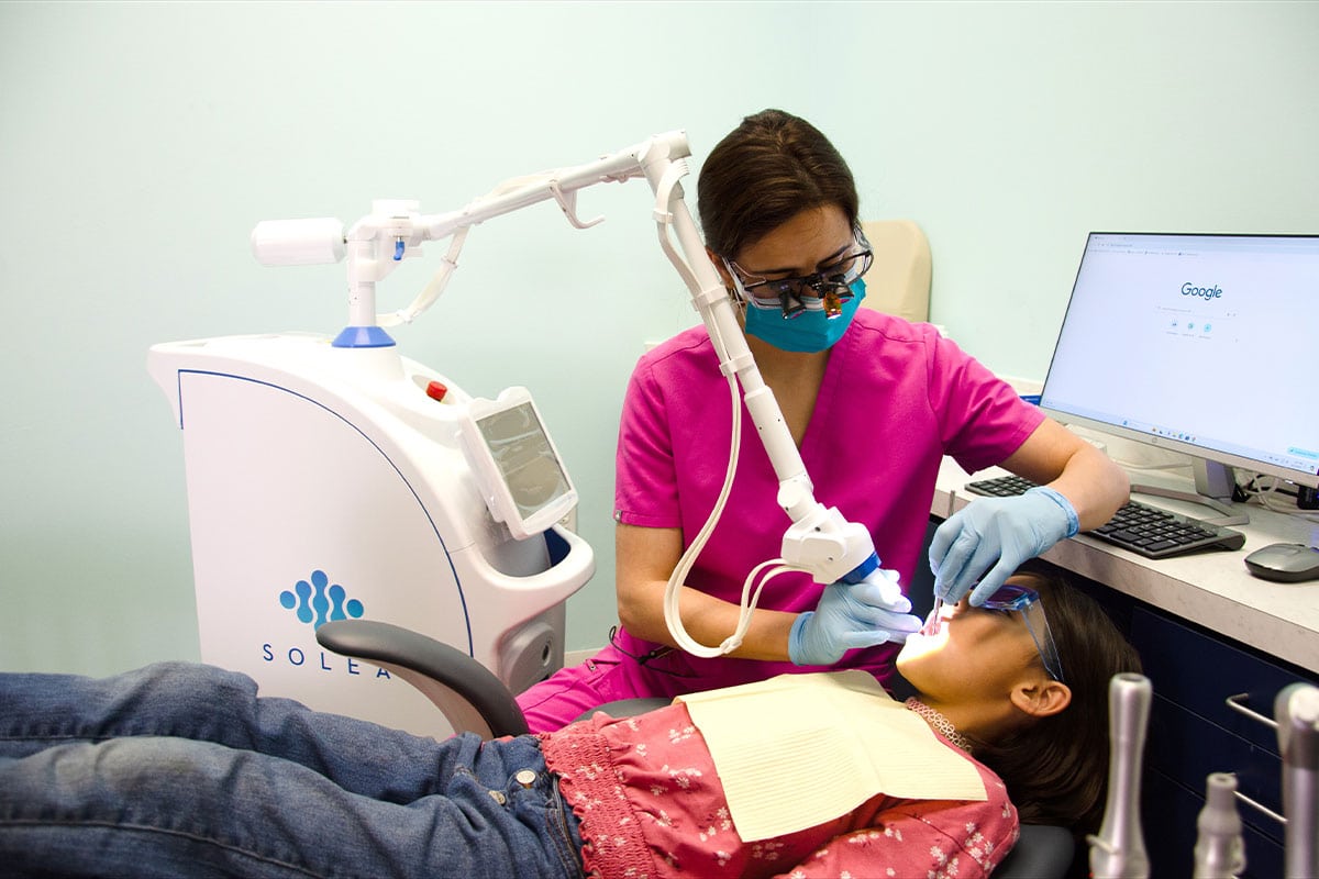 Dr. Uzma using the Solea Laser on Patient