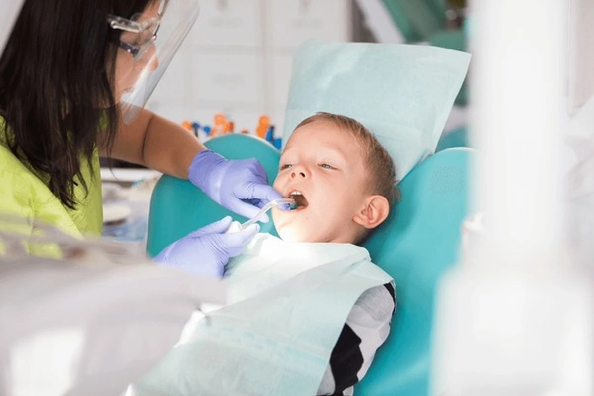 Dental sealants for kids Frisco TX at Dental Smart Kids: young child comfortably receiving sealants