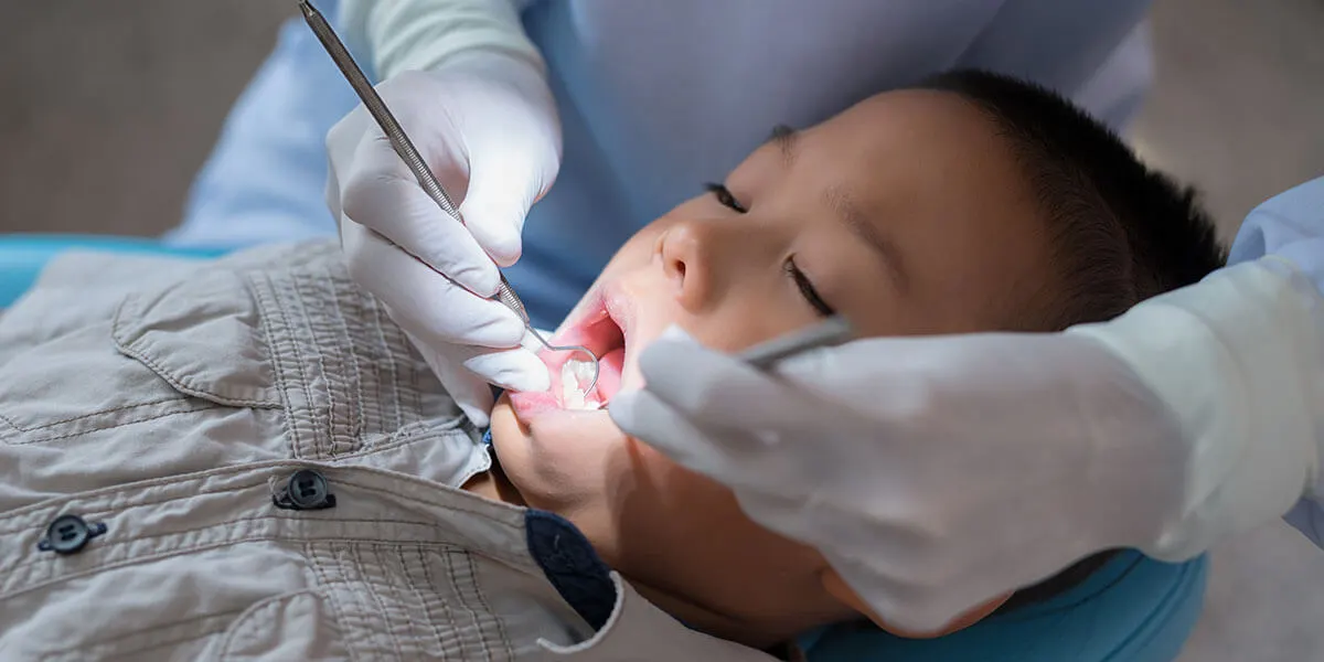 General anesthesia Frisco TX child receiving dental treatment with sedation at Dental Smart Kids