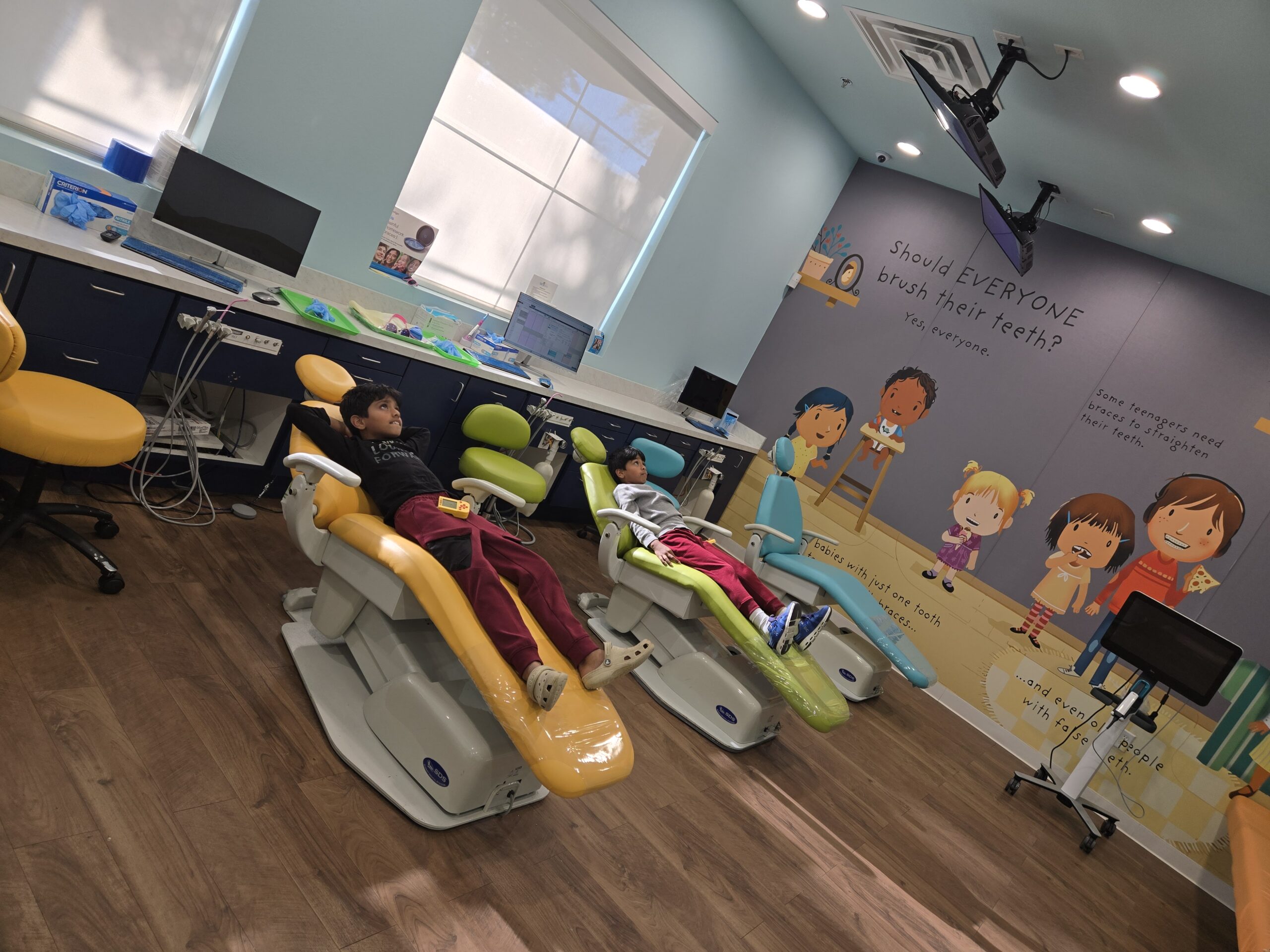 Dental Sealants for Kids Frisco TX – Dental Smart Kids child patients relaxing in colorful pediatric dental clinic